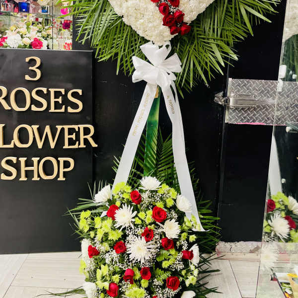 In memory of your loss. By 3 Roses Flower Shop