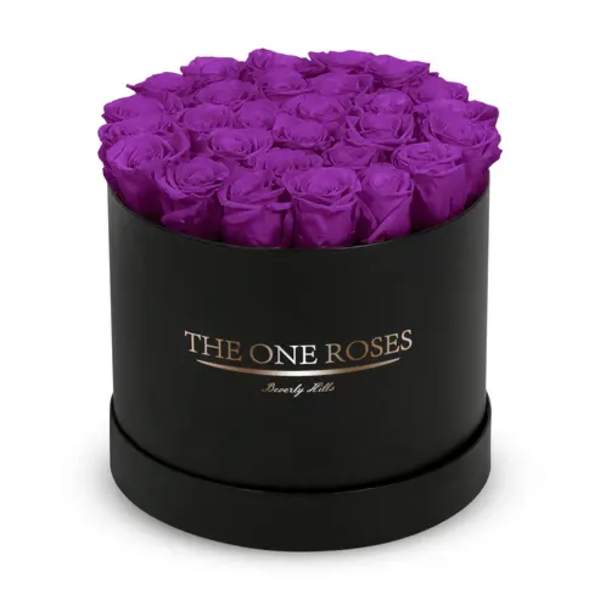 Purple roses arranged in a black round box