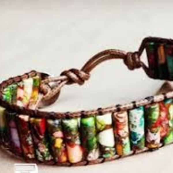 Colorful woven bracelet with a brown cord closure