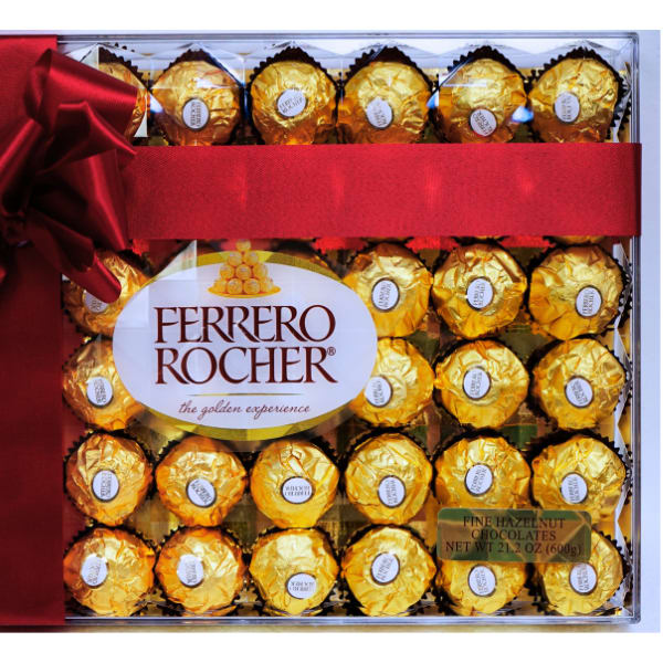 Box of Ferrero Rocher chocolates tied with a red ribbon and bow