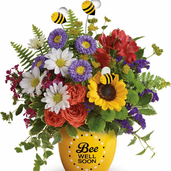 Mixed bouquet in a yellow vase with bee decorations and "Bee Well Soon" text