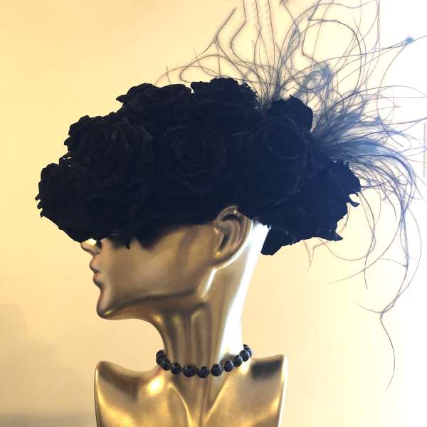 Black rose headpiece on a mannequin bust
