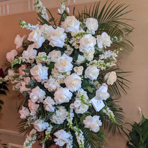 Traditional Rose Easel Spray is huge, and makes a dramatic statement.