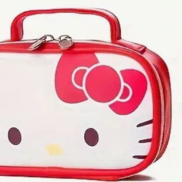 Hello Kitty lunch bag with a red handle and zipper