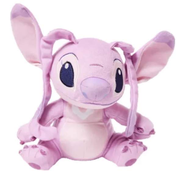 Pink plush character toy with large ears on a white background