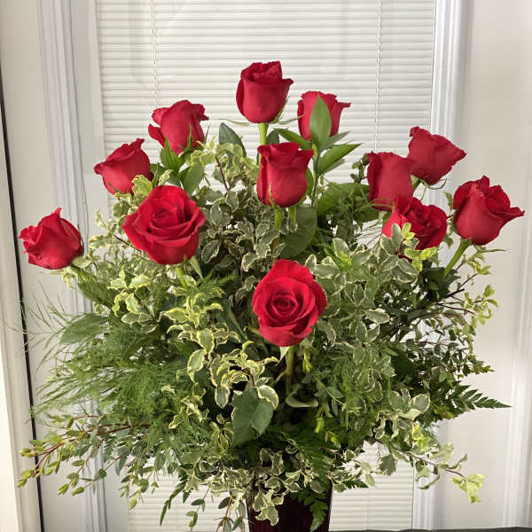 One Dozen Red Roses with Silver Queen Pittosporum