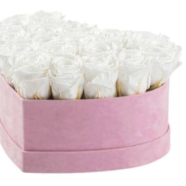 Box of white roses in a pink hatbox