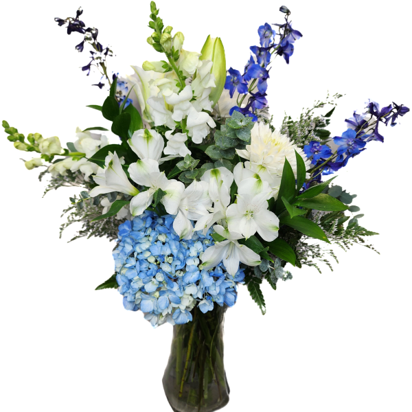 Blue and white floral arrangement in a glass vase