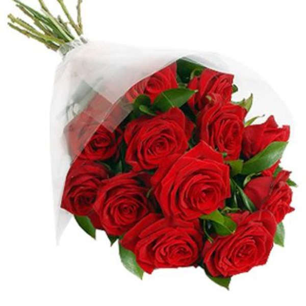 Bouquet of red roses wrapped in white paper