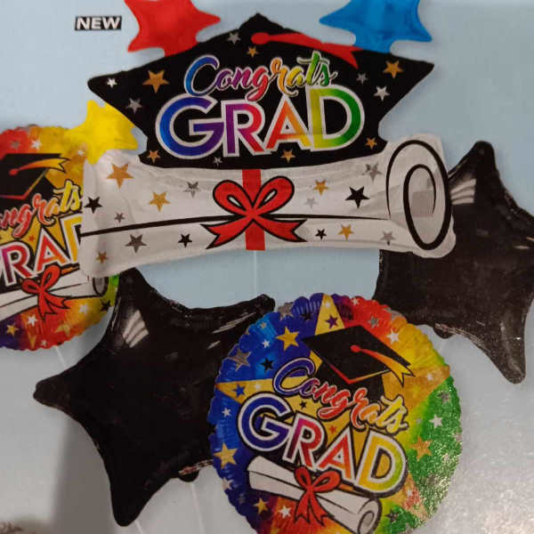 Graduation-themed star balloons with "Congrats Grad" text