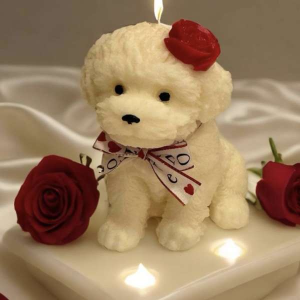 Plush white puppy with red roses on a lit white base