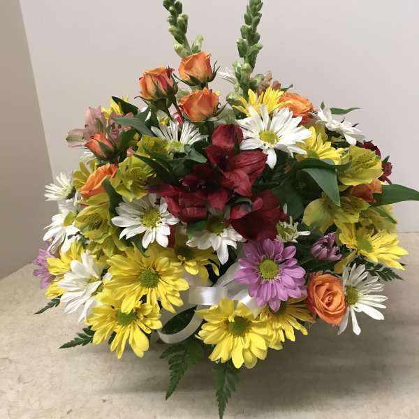 Colorful mixed bouquet with daisies, roses, and alstroemeria