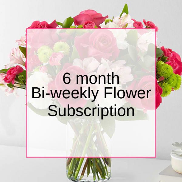 Mixed pink and white bouquet in a glass vase with subscription text overlay