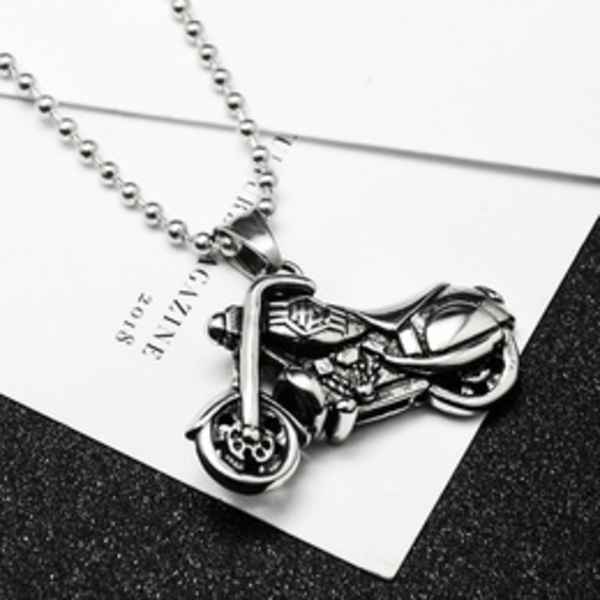Silver motorcycle pendant necklace on a card