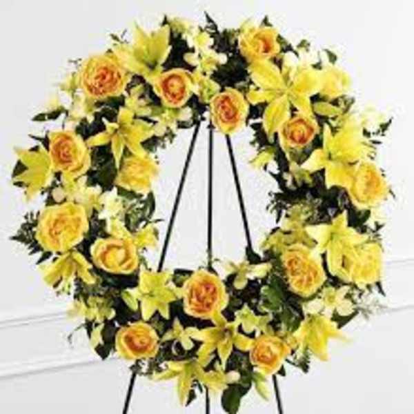 Yellow floral wreath on a black easel