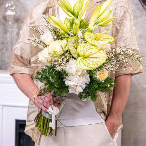 Bouquet of white and pale green flowers with anthuriums and lilies