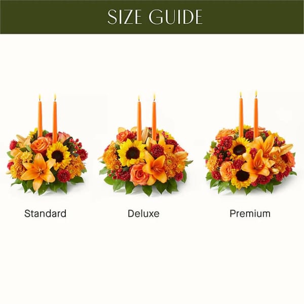 Three autumn floral centerpieces with orange candles labeled standard, deluxe, and premium.