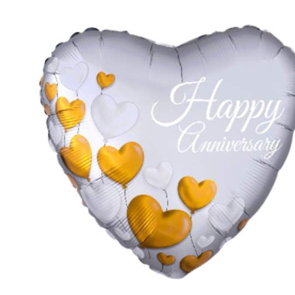Heart-shaped silver balloon with gold and white hearts and "Happy Anniversary" text