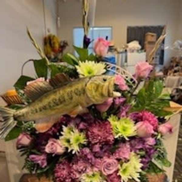 Fish-shaped floral arrangement with pink and green flowers