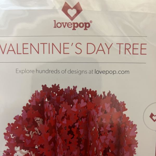 Valentine's Day tree covered in red and pink heart cutouts