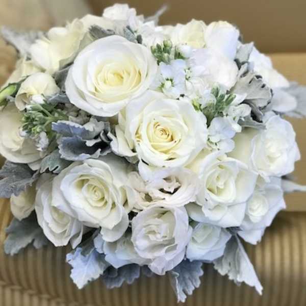 White rose bouquet with pale blue-gray foliage