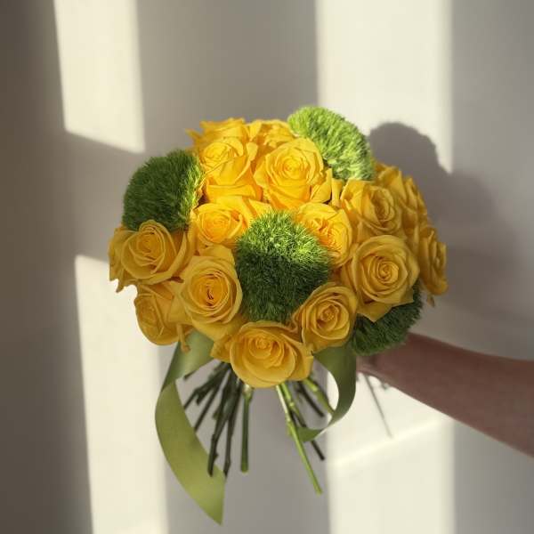 Yellow rose bouquet with green pom-pom accents