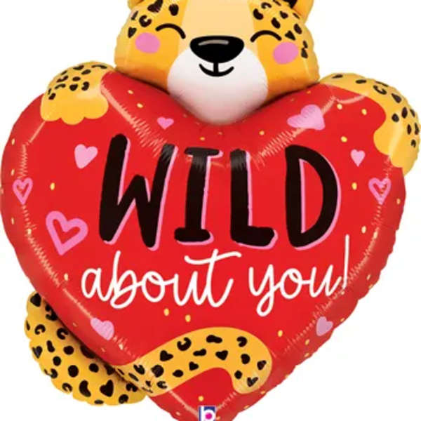 Heart-shaped leopard balloon with a cheetah face and "WILD about you" text