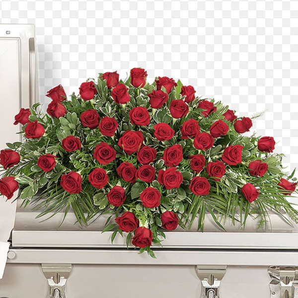 Red rose casket spray with greenery on a white casket