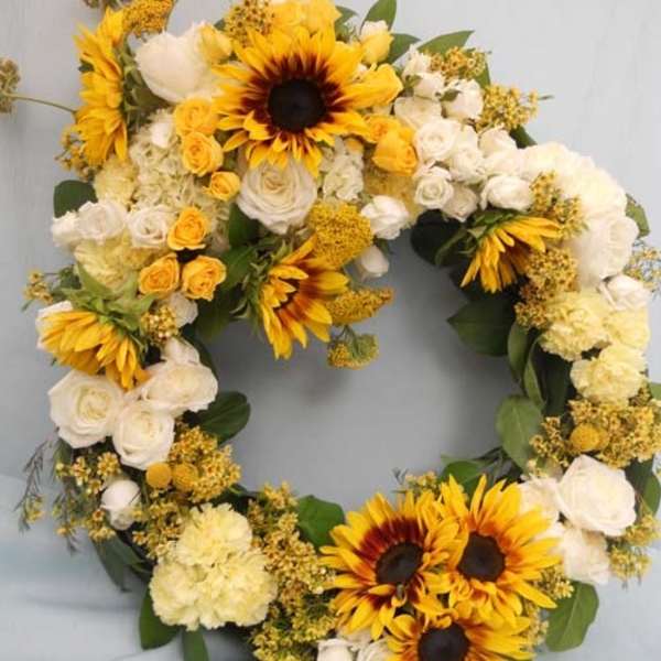 Sunflower and white rose wreath with yellow accents