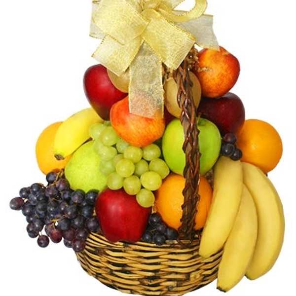 Fruit basket with bananas, grapes, apples, oranges, and a ribbon bow