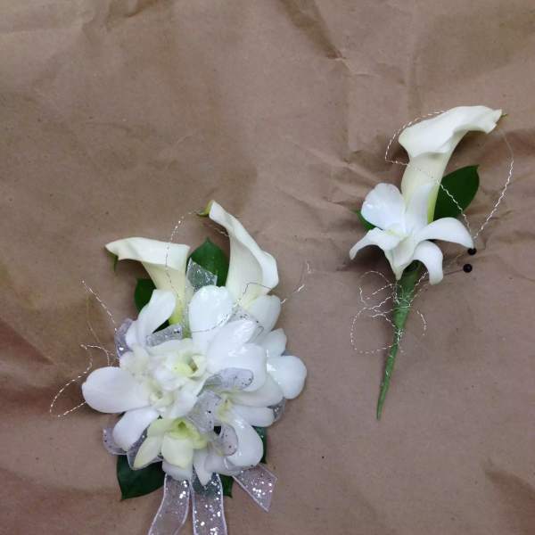 White calla lily corsage and boutonniere with silver ribbon
