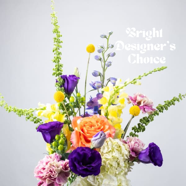 Colorful mixed bouquet with roses, lisianthus, and yellow snapdragons