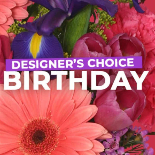 Bright mixed bouquet with a large pink gerbera and purple iris, overlaid with birthday text