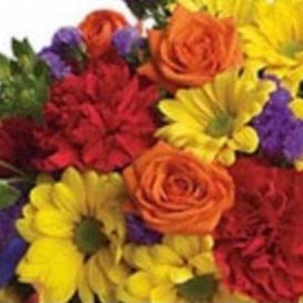 Mixed bouquet of yellow daisies, orange roses, red carnations, and purple flowers