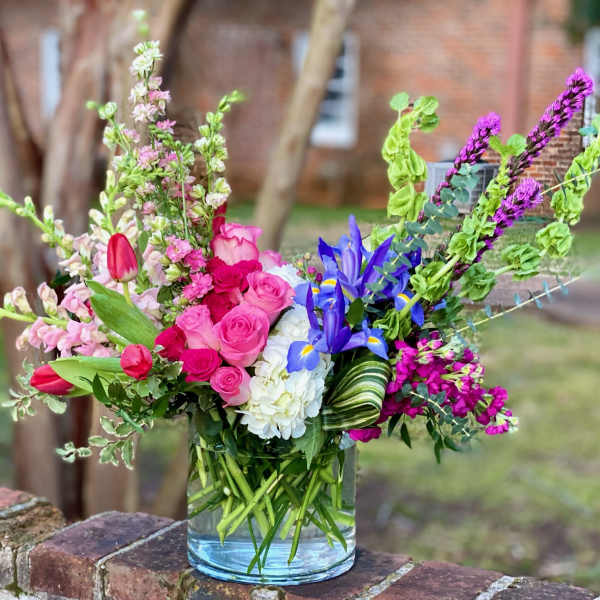 Colorful mixed bouquet in a clear glass vase