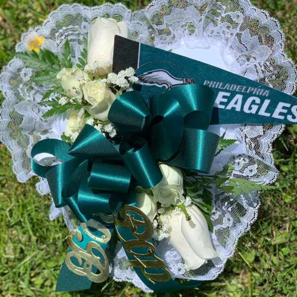 White rose bouquet with teal ribbon and lace trim