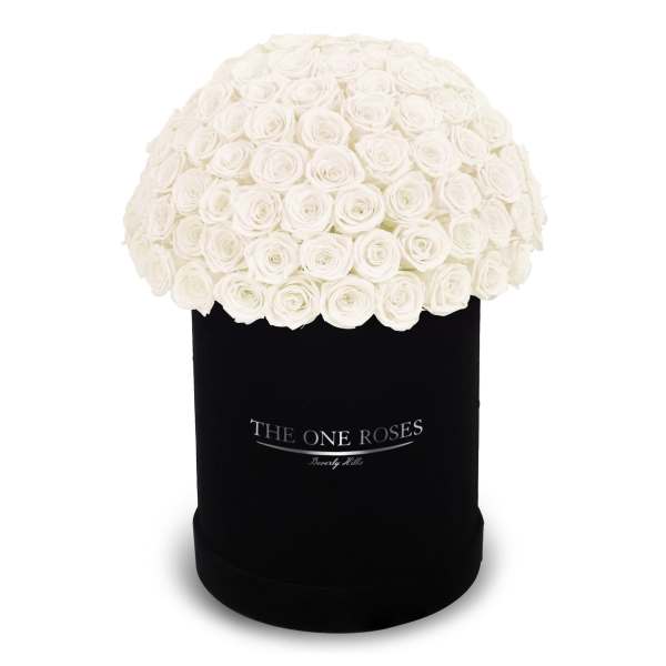 White rose bouquet in a black cylindrical box