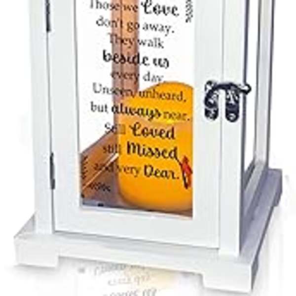 White memorial lantern with a printed quote and candle inside