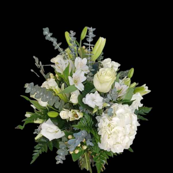 White floral bouquet with lilies, roses, and hydrangea
