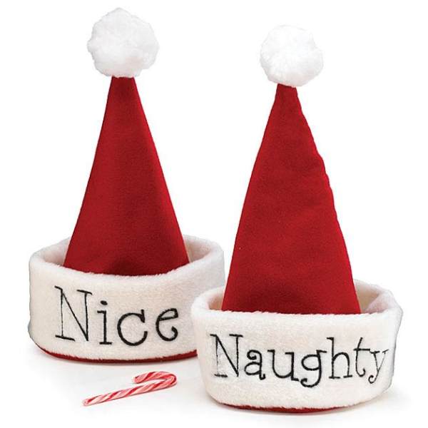 Two Santa hats labeled Nice and Naughty with a candy cane