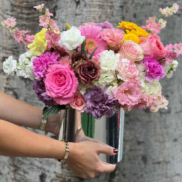 Mixed pink and white bouquet in a silver vase
