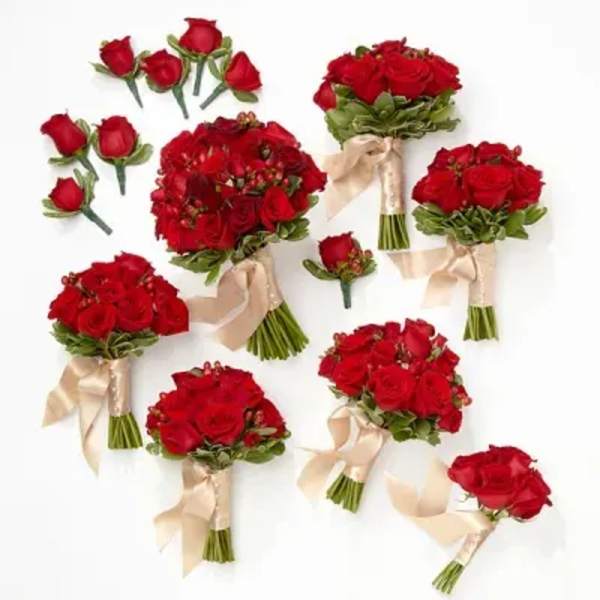 Assorted red rose bouquets and boutonnieres with cream ribbons