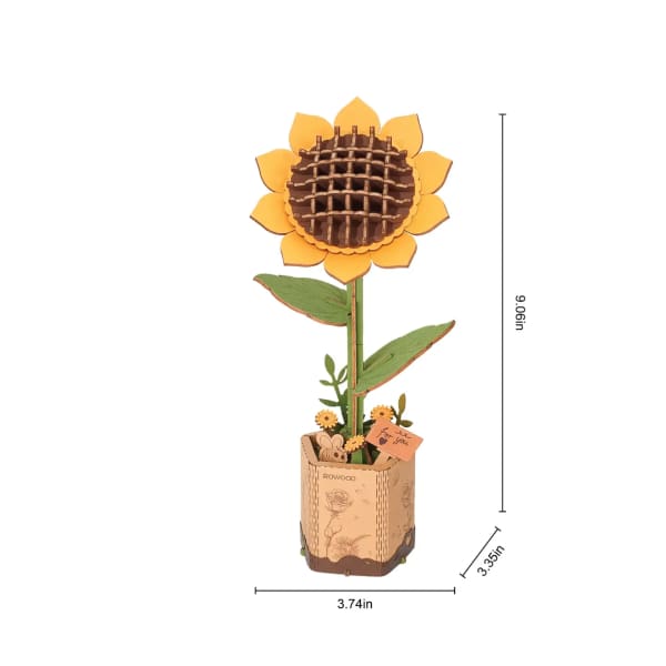 Wooden sunflower in a small decorative pot with a tiny card