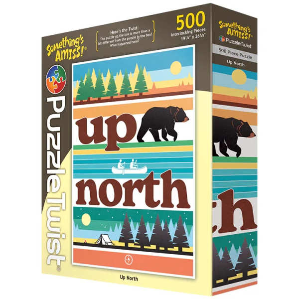 Boxed 500-piece puzzle with a bear and forest scene