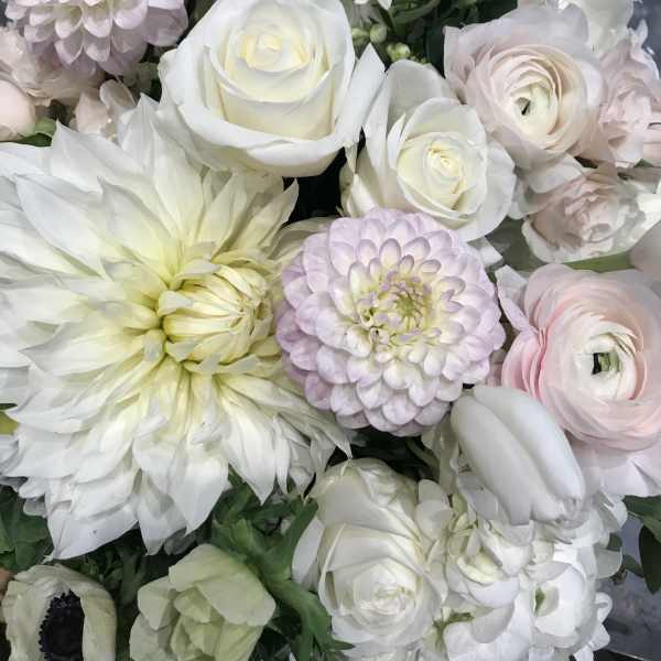 Bouquet of white and pale pink flowers with large blooms