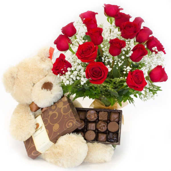 Red roses with a teddy bear and box of chocolates