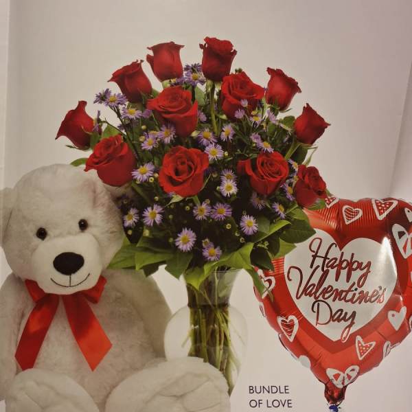 Red rose bouquet with a teddy bear and Valentine balloon