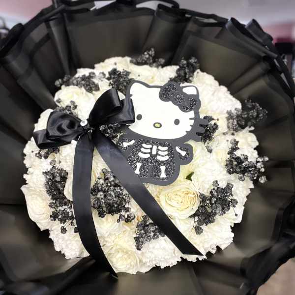 White rose and carnation bouquet with black ribbon and Hello Kitty topper