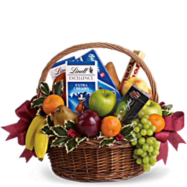 Gift basket with fruit and chocolate bars in a wicker basket