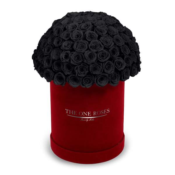 Black rose bouquet in a red round box